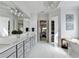 Beautiful bathroom with dual vanities, ample counter space, and a view into the bedroom at 2892 Darlington Run, Duluth, GA 30097