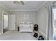 Cozy bedroom featuring a white crib, neutral walls, and carpeted floors for a comfortable Bedroom at 2892 Darlington Run, Duluth, GA 30097