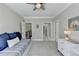 Cozy bedroom featuring a daybed, neutral paint, and a ceiling fan at 2892 Darlington Run, Duluth, GA 30097