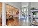 Spacious foyer with hardwood floors, columns, staircase, and adjacent dining room, creating an elegant entrance at 2892 Darlington Run, Duluth, GA 30097