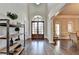 Elegant foyer featuring hardwood floors, a grand arched entrance, and abundant natural light at 2892 Darlington Run, Duluth, GA 30097