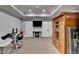 An open-concept gym features a dry sauna and ceiling fan at 2892 Darlington Run, Duluth, GA 30097