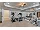 An expansive home gym featuring various exercise equipment and mirrored walls for full visibility at 2892 Darlington Run, Duluth, GA 30097