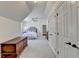 Hallway featuring built in storage leading to a main bedroom at 2892 Darlington Run, Duluth, GA 30097