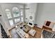 Elegant living room with high ceilings, fireplace, and large windows that offer great natural lighting at 2892 Darlington Run, Duluth, GA 30097