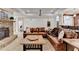 The living room features a fireplace, comfortable seating, and a convenient wet bar for easy entertaining at 2892 Darlington Run, Duluth, GA 30097