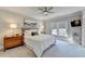 Serene main bedroom with a large bed, soft lighting, and a calming color scheme for relaxation at 2892 Darlington Run, Duluth, GA 30097
