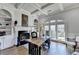 Bright office featuring a fireplace, built-in bookshelves, and a large window at 2892 Darlington Run, Duluth, GA 30097