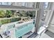 View of the private swimming pool, hot tub, and patio area from inside the home at 2892 Darlington Run, Duluth, GA 30097