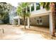 The home features an outdoor space with a gray brick patio cover at 3045 Camp Branch Rd, Buford, GA 30519
