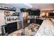 Elegant bar area featuring stainless steel appliances and tile flooring at 3045 Camp Branch Rd, Buford, GA 30519