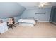 Bedroom with plush carpeting, dormered ceiling, teddy bear, neutral color scheme, and ceiling fan at 3045 Camp Branch Rd, Buford, GA 30519