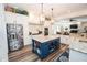 Gourmet kitchen with a blue island, granite countertops, and stainless steel appliances at 3045 Camp Branch Rd, Buford, GA 30519