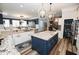 Spacious kitchen with granite countertops, stainless steel appliances, and an island with storage at 3045 Camp Branch Rd, Buford, GA 30519