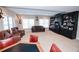 Spacious living room with cozy seating and large built-in cabinets at 3045 Camp Branch Rd, Buford, GA 30519