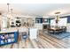 Open concept kitchen and dining area with island and inviting dining room at 3045 Camp Branch Rd, Buford, GA 30519