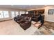 Home theater room with multiple leather recliners and a wet bar at 3045 Camp Branch Rd, Buford, GA 30519