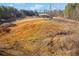 Aerial view of the property's expansive land and surrounding landscape at 511 Monroe Cole Rd, Dallas, GA 30157