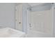 Bright bathroom features a white tub and vanity and light blue walls at 16 Vaughan Ne Dr, Cartersville, GA 30121