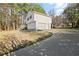 Long, wide driveway leading to home's attached garage at 16 Vaughan Ne Dr, Cartersville, GA 30121