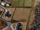 Aerial view of a land lot ready for building, perfectly situated among mature trees in an established neighborhood at 5170 Howard Road A, Cumming, GA 30040