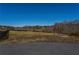 Picturesque lot featuring tranquil scenery, privacy fence, and natural surroundings at 5170 Howard Road A, Cumming, GA 30040