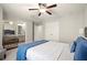 Bedroom with ensuite bathroom and large closet; features a ceiling fan at 170 Wheaten Dr, Woodstock, GA 30188