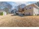 The backyard includes an entertainment deck, patio, green shed and space for outdoor activities at 1800 Rockdale Cir, Snellville, GA 30078
