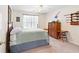 Cozy bedroom with a queen-size bed, carpet flooring, and ceiling fan at 1800 Rockdale Cir, Snellville, GA 30078