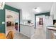 Bright kitchen with white cabinets, stainless steel appliances, and an open layout at 1800 Rockdale Cir, Snellville, GA 30078