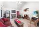 Inviting living room with vaulted ceilings, a stone fireplace, and comfortable furnishings at 1800 Rockdale Cir, Snellville, GA 30078