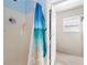 Modern shower with stylish curtain, and a white tiled wall at 1800 Rockdale Cir, Snellville, GA 30078