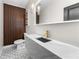 Bathroom features a marble countertop and decorative wall decor at 2751 Margaret Mitchell Nw Dr, Atlanta, GA 30327
