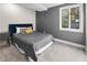 Bedroom with a large window, carpet and contemporary gray paint at 2751 Margaret Mitchell Nw Dr, Atlanta, GA 30327