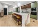Stylish kitchen features a large island with seating and ample counter space at 2751 Margaret Mitchell Nw Dr, Atlanta, GA 30327