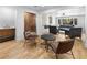 Living room featuring hardwood floors, modern decor and ample seating at 2751 Margaret Mitchell Nw Dr, Atlanta, GA 30327