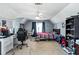 Bedroom featuring carpet, ceiling fan, window and closet at 935 Sunset Ridge Ln, Lawrenceville, GA 30045