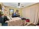 Comfortable bedroom with a cozy bed and natural light from the window at 935 Sunset Ridge Ln, Lawrenceville, GA 30045