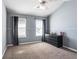 Bedroom featuring window and dresser at 935 Sunset Ridge Ln, Lawrenceville, GA 30045