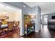 Inviting entryway with hardwood floors and an elegant hall table featuring tasteful decor and artwork at 935 Sunset Ridge Ln, Lawrenceville, GA 30045