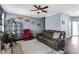 Cozy living room boasts stylish furniture, contemporary décor, and a warm, inviting atmosphere at 935 Sunset Ridge Ln, Lawrenceville, GA 30045