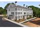 Beautiful new construction townhome with lush landscaping, balconies, and classic design at 245 Mayfair Ct, Alpharetta, GA 30009
