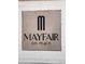 Mayfair on Main community sign set in a neutral colored stone at 245 Mayfair Ct, Alpharetta, GA 30009