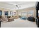 Spacious bonus room featuring neutral walls, recessed lighting, and comfortable couches at 5640 Copper Creek Pass, Cumming, GA 30040