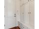 Mudroom features built-in lockers, drawers, and bench providing ample storage and organization at 5640 Copper Creek Pass, Cumming, GA 30040