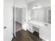 Bathroom features double sinks, granite counters, and modern fixtures at 6719 Winterberry Ridge Dr, Stone Mountain, GA 30087