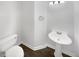 Features a pedestal sink, toilet, and modern fixtures at 6719 Winterberry Ridge Dr, Stone Mountain, GA 30087