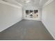 Spacious main bedroom featuring soft carpet and a large window at 6719 Winterberry Ridge Dr, Stone Mountain, GA 30087