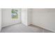 This walk-in closet features carpeting and wire shelving at 1452 Stephens View Dr, Loganville, GA 30052