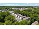 Stunning aerial view of the property surrounded by lush greenery and the cityscape, showcasing its prime location at 321 Dilbeck Ne Cir, Atlanta, GA 30342
